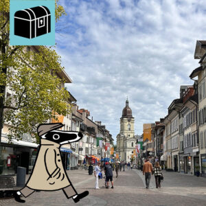 Erlebe die Detektiv-Trails mit Detektiv Dachs: Ein spannendes Rätselerlebnis für Jung und Alt. Du begibst dich auf eine Entdeckungstour durch Morges, die charmante Stadt am Ufer des Genfersees. Der Trail führt dich durch den idyllischen Parc de l’Indépendance, wo jedes Jahr das farbenfrohe Tulpenfest stattfindet, und weiter durch die malerische Altstadt mit ihren alten Gasthäusern wie der Pinte und den kunstvoll verzierten Wirtshausschildern. Beim Rathaus erfährst du, dass hier einst Audrey Hepburn geheiratet hat, und im Quartier des Halles tauchst du in das lebendige Herz der Stadt ein. Unterwegs lernst du, wer Dr. Yersin war – eine bedeutende Persönlichkeit aus der Geschichte von Morges. Der Weg führt dich zudem zum Temple de Morges, bevor du am Quai entlang zum Hafen gelangst, wo dich ein herrlicher Blick auf den See und die Alpen erwartet. Die abwechslungsreiche Route verbindet Geschichte, Rätselspass und Genuss auf unterhaltsame Weise und lässt dich Morges von seiner schönsten Seite erleben. Der Detektiv-Trail Morges bietet eine harmonische Mischung aus Rätsellösen, Bewegung und Kulturgenuss. Perfekt für Familien, Kinder, Schulklassen, Grosseltern und alle, die gerne draussen unterwegs sind. Viel Vergnügen auf deinem Rätselabenteuer!